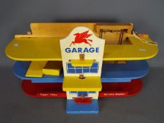 Tiger Toys - A vintage unboxed Tiger Toys of Petersfield wooden 'Garage'.