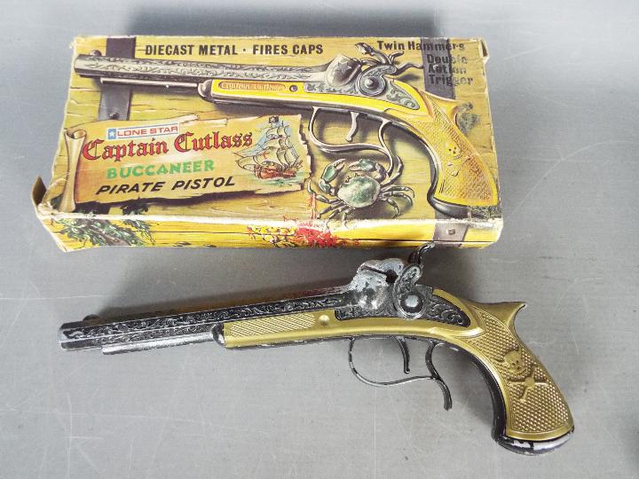 Lone Star, Crescent, Cap Guns - A collection of three boxed vintage toy cap guns. - Image 2 of 5