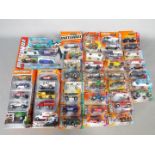 Matchbox - Approximately 30 blister carded modern issue Matchbox diecast vehicles together with