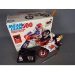 Galoob - A boxed vintage 'Mean Lean 500' radio control racing cycle.