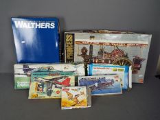 Lindberg, Bandai, Walthers Cornerstone, Academy - A group of plastic model kits in various scales.