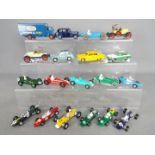 Dinky Toys, Corgi Toys - An unboxed collection of diecast models predominately racing cars.