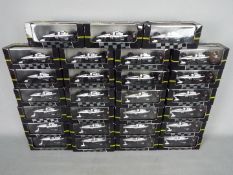 Onyx - Approximately 27 boxed diecast Formula 1 racing cars by Onyx.