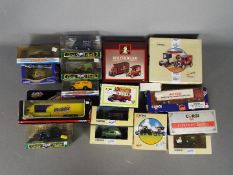 Corgi, Matchbox Dinky - A collection of 17 boxed diecast model vehicles in various scales.