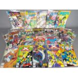 Marvel - A group of 25 modern age comics, predominately contained in clear plastic sleeves.