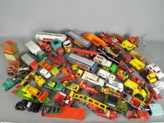 Dinky, Corgi, Matchbox - An unboxed collection of over 40 diecast vehicles.