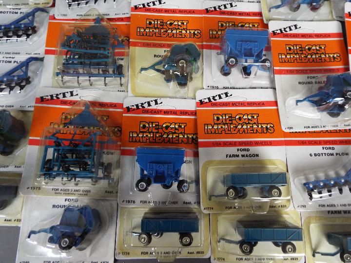 ERTL - Over 40 diecast 1:64 scale carded model farm implements. - Image 2 of 3
