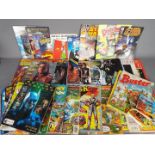 A quantity of comics to include Star Wars, Star Trek, Disney, He-Man, Transformers and similar,