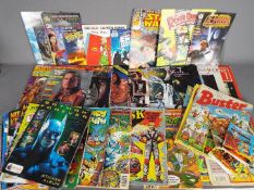 A quantity of comics to include Star Wars, Star Trek, Disney, He-Man, Transformers and similar,