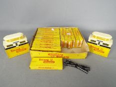 Triang - A collection of 16 boxed Triang TT gauge model railway track and accessories.