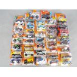 Matchbox - Approximately 40 blister carded modern issue Matchbox diecast vehicles.