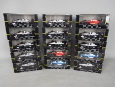 Onyx - 15 boxed diecast F1 racing cars by Onyx.