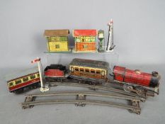 Hornby, Crescent, Brimtoy - A small collection of tinplate and clockwork toys.