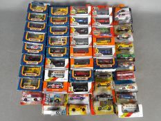 Matchbox - Over 40 boxed / carded mainly modern Matchbox vehicles Made in Macau / China / Thailand.