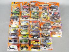 Matchbox - Approximately 40 blister carded modern issue Matchbox diecast vehicles.