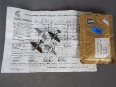 Helmet Models - Four unboxed 1:200 scale white metal model Spitfires from Helmet Models / Helmet