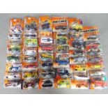 Matchbox, Other - Over 45 blister carded modern issue Matchbox diecast vehicles.
