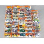 Matchbox - Approximately 40 blister carded modern issue Matchbox diecast vehicles.