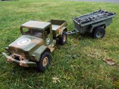 R/C plastic model 4X4 US army truck with working lights and front and rear suspension.