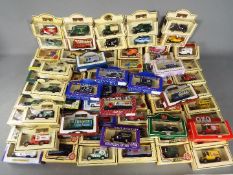 Lledo - A boxed collection of over 50 diecast model vehicles by Lledo.