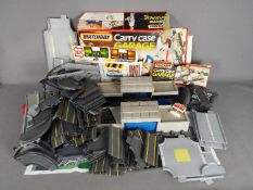 Matchbox - A vintage 1980's boxed CC18 Matchbox Carry Case Garge with a large quantity of unboxed