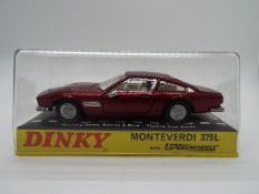 Dinky Toys - A boxed Dinky Toys #190 Monteverdi 375L in dark red metallic, with white interior,