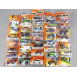 Matchbox - Approximately 40 blister carded modern issue Matchbox diecast vehicles.