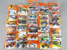 Matchbox - Approximately 40 blister carded modern issue Matchbox diecast vehicles.