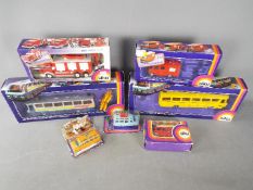 Siku - Seven boxed / carded diecast vehicles by Siku.