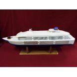 A large plastic model of a cruise ship 'Joshie'.