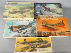 Airfix, Revell - Five vintage boxed plastic model kits in various scales.