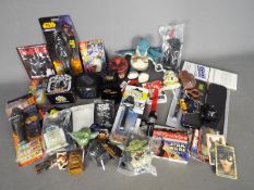 Lego, Walkers, Tomy, Others - A mixed collection of Star Wars related toys,