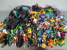 Kenner, Playmates, McDonalds, ITC, Other - A large unboxed collection of action figures,
