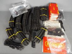 Hornby, Peco - A large quantity of mainly unboxed OO gauge model railway track plus some ephemera.