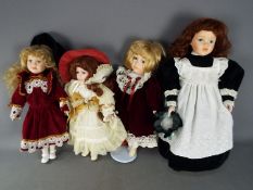 4 Dressed collectable unmarked, painted glass eyed dolls.