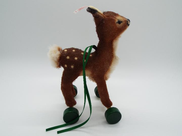 Steiff - A boxed, limited edition Steiff # 681417 'Fawn On Wheels ornament', white tag, - Image 5 of 5