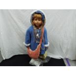 A very large, limited edition, German vinyl dressed doll,