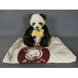 Charlie Bears - A Charlie Bears soft toy teddy bear in the form of a panda, # CB614989 'Mistletoe',