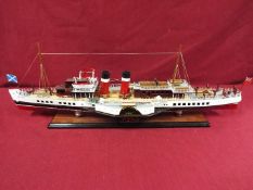 A display model of the last sea-going paddle steamer 'Waverley'.