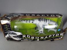 Radio controlled Robonetics Roboraptor animated dinosaur in original box,