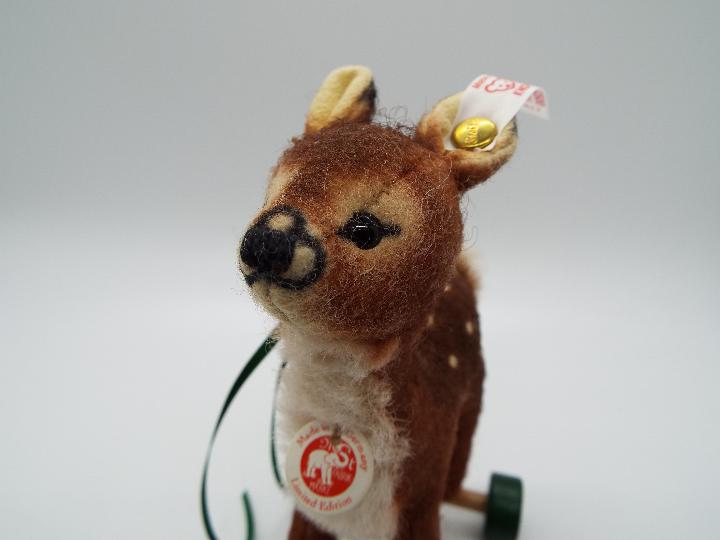 Steiff - A boxed, limited edition Steiff # 681417 'Fawn On Wheels ornament', white tag, - Image 4 of 5