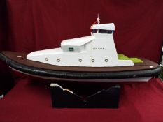 A fibreglass constructed prototype model of a yacht entitled 'Venture' .