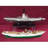 A resin model on stand of a U-Boat measuring approximately 20cms (H) x 48cms (L) x 7cms (W)