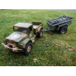 R/C plastic model 4X4 US army truck with working lights and front and rear suspension.