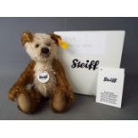 Steiff - A boxed Steiff 'Cappuccino Bear' # 039768, yellow tag,