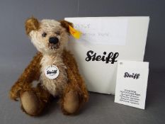 Steiff - A boxed Steiff 'Cappuccino Bear' # 039768, yellow tag,