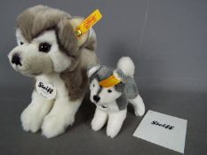 Steiff - Two Steiff dogs comprising # 104985 'Bernie The Husky' (15 cm h),