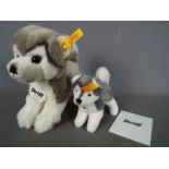 Steiff - Two Steiff dogs comprising # 104985 'Bernie The Husky' (15 cm h),