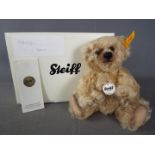 Steiff - A boxed Steiff bear # 001031 'Jona', yellow tag,