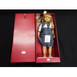 Gotz - A boxed, vinyl dressed doll by Gotz, blonde hair, necklace and bracelet,